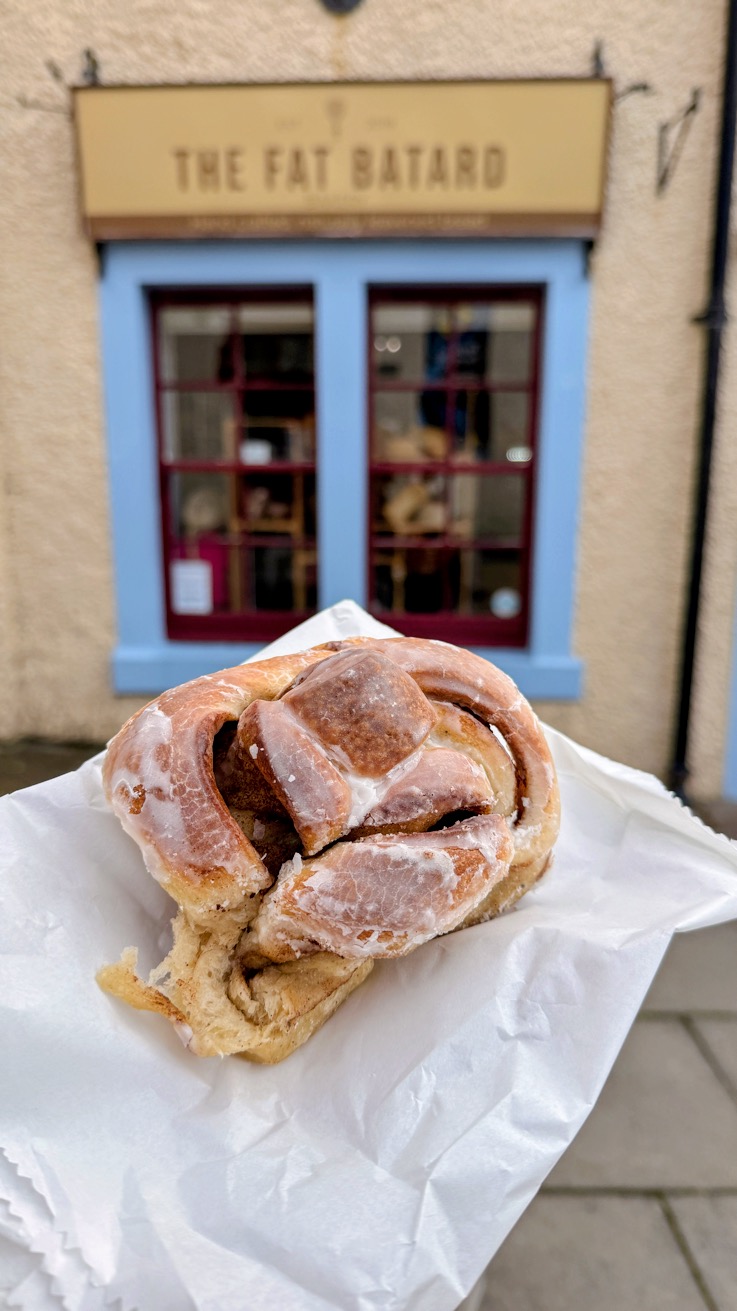 Handcrafted sourdough loaves cooling on the rack